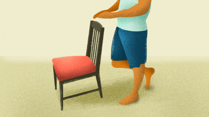 Stand on your injured foot and balance yourself using a chair for stability